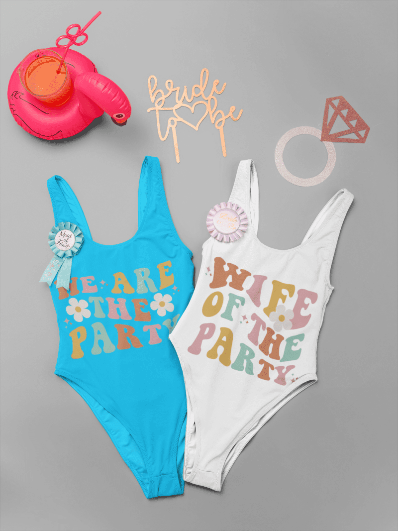 mockup featuring two bachelorette swimsuits lying on a solid color background 29573